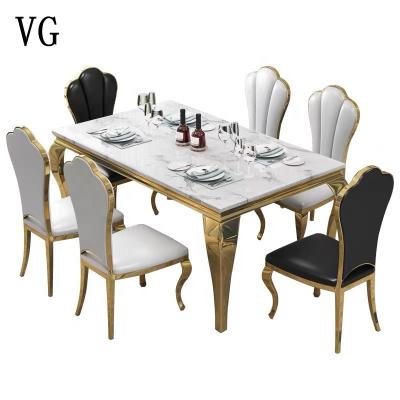 China Luxury Italian Light Luxury Gold Plated Stainless Steel Dining Tables And Chairs for sale