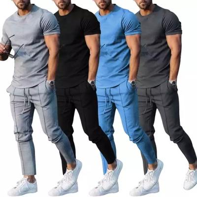 China Summer Autumn Mens Tracksuit O-Neck QUICK DRY Shorts Sheath Casual Workout Clothes Gym Tights T-shirt Sport Wear Tops And Bottoms for sale