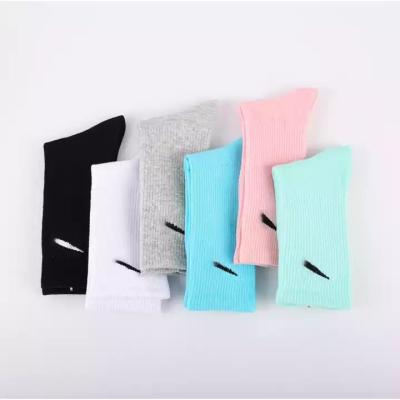 China Wholesale New Breathable Cheap Socks Thin Candy Color Cotton Tube Women Branded Graffiti Luxury Nk Sports Socks for sale