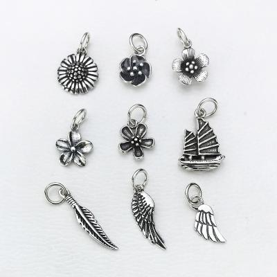 China CLASSIC Classic Chrysanthemum Vintage Style Feather Pendant Wing Charm Pendant for sale