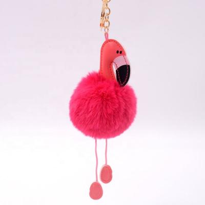 China Promotion Auto Gift Upholstery Artificial Rabbit Fur Ball With Leather Flamingo Key Chain for sale