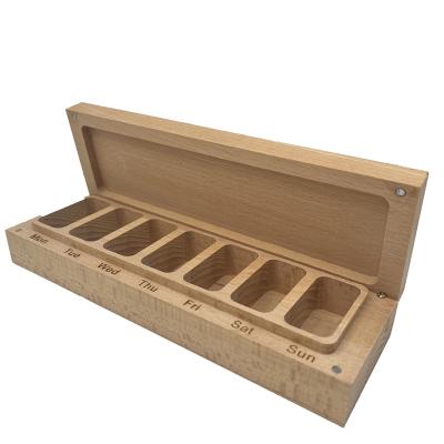 China Best Selling Pull Band 7 Case Pill Organizer Wooden Weekly Plastic Pill Box Storage Box for sale