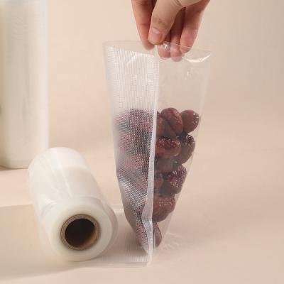 China Shock Resistance Food Grade Plastic Packaging Seal Storage Embossed Vacuum Bag for sale