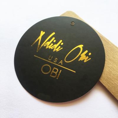 China Custom 400gsm Sustainable Round Printed Gold Foil Paper Hang Tag For Clothing for sale