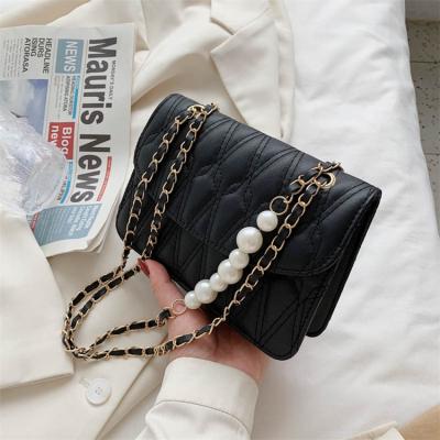 China Low price good quality waterproof customizable personalized young ladies bags with pearl straps for sale