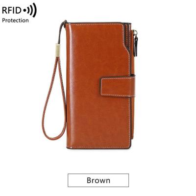 China RFID customized name rfid safe pure leather cheap bifold wallet unisex small long for sale