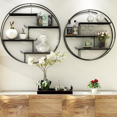 China Wholesale Minimalist Nordic Traditional Chinese Round Shelf Art Wall Decorative Metal Iron Storage Living Room Background Display Rack for sale