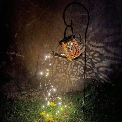 China Solar Garden Metal Kettle LED Light Water Shower Bottle Water Waterproof Outdoor Decorative Cavity Iron Wrought Artwork Lamp for sale