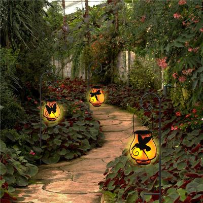 China Waterproof Garden Solar Power Metal Craft Butterfly Dragonfly Bird LED Lantern Vintage Style Iron Hanging Yellow Flame Light For Christmas for sale