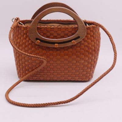 China Fashion high quality women's hand held genuine leather woven bag with wooden handle include detachable cross body strap for sale