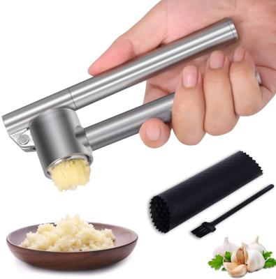 China Sustainable 304 Stainless Steel Garlic Crusher And Peeler Garlic Ginger Press Set for sale