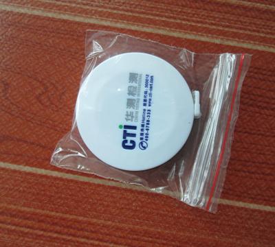 China Custom printed logo small round tape measure for sale