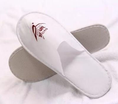 China Cheap disposable hotel slippers with Customized logo for sale