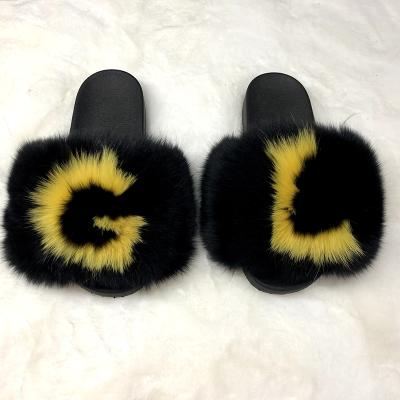 China 2021 Fashion Trend Design New Arrival Women's Raccoon Fur Slippers Fluffy Fox Fur Slides for sale