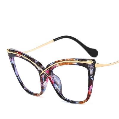 China Popular Retro Trendy Metal Flat Lens Tr90 Large Frame Cat Eye Anti Blue Light Glasses Latest New Design Women Glasses Frame for sale