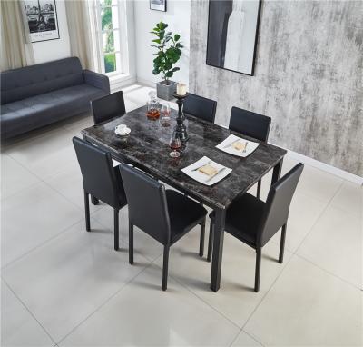 China Modern dining table and chairs Morden style dining room furniture PU top black brown color chair hot popular marble table. for sale