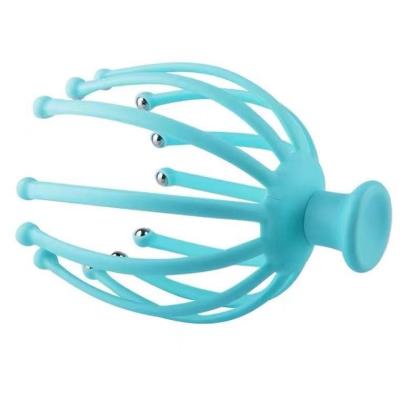 China Octopus Head Manual Circulatory Head Massager Portable Scalp Silicone Blood Massager for sale