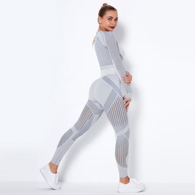 China 2022 Hot Sale European Design Seamless Breathable YS630 Cavity Out Of Long Sleeve Yoga Set Women Sports Clothing Wholesale 1 Tops+Pants for sale