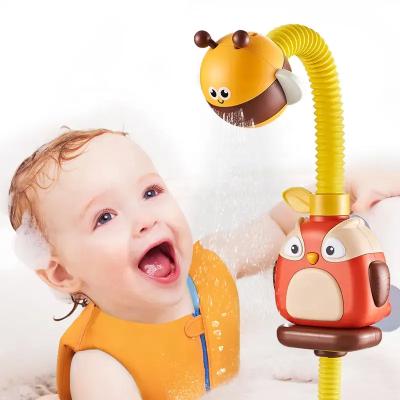 China Water Spraying Tool Owl bee electric water spaying rain shower head pump bath toy for sale