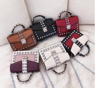 China High Quality Lady Fashion Shoulder Bags Wholesale Rivet Clips Handbags For Women for sale