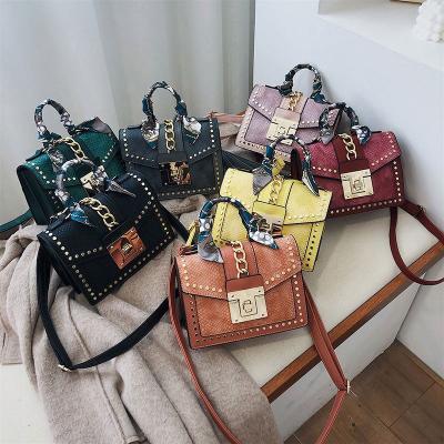 China Hot Selling Luxury Handbags Ladies Purses Small Rivet Bag High Quality Square Women Handbags for sale