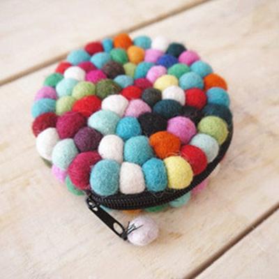 China Eco-fiendly anti-slip wool Nepal 100% handmade wool felt ball blankets for sale