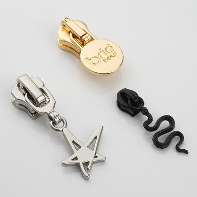 China Other Exquisite Metal Pattern Auto Lock Zipper Slider Creative Mental Zipper Head for sale