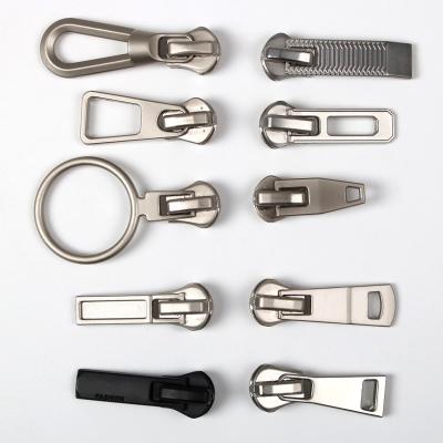 China Other Hot Selling Zinc Alloy Engrave Mental Custom Logo Metal Slider Zipper Puller Zipper Puller Head for sale