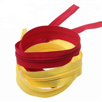 China Environmental Friendly Factory Hot Sales Price Cheap 3#Invisible Long Chain Zipper , Zipper Roll Netting for sale