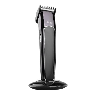 China Household DSP Hair Cutting Tool Design Cordless Trimmer Rechargeable Hair Trimmer With Filling Base for sale