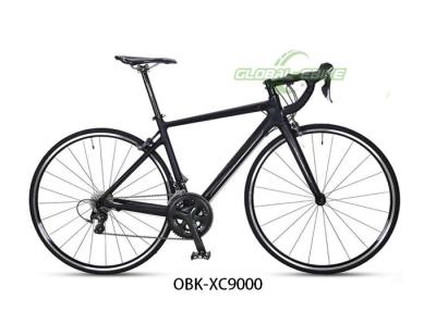 China Bicicleta de carretera de carbono negro unisex, bicicleta con sistema de freno V para viajar por carretera en venta