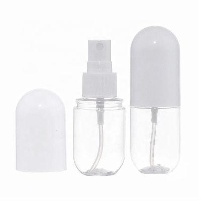 China Cosmetic Unique Capsule Shape Plastic Packaging 30ml 40ml 50ml 60ml PET Fine Spray Mist Sprayer Personal Care Lot Sanitizer Bottle for sale