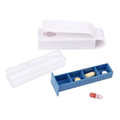 China Promotional PP Plastic Pill Cutter Remover Pill Puncher for sale