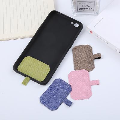 China Cheap Universal Oxford Cloth Promotion Item Phone Lanyard Holder Patch Oxford Cloth Patch For iPhone 13 max pro for sale