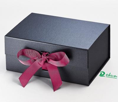 China Beauty Magnetic Foldable Luxury Skin Care Cosmetics Recyclable Customized Rigid Closure Gift Box With Ribbon for sale