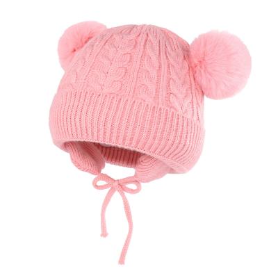 China Solid color double ball twist autumn and winter children's hat manufacturers custom ear cashmere baby wool JOINT warm hat for sale