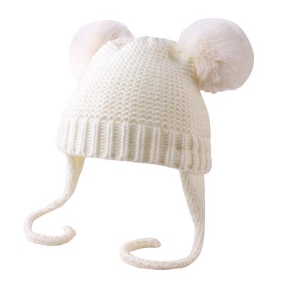 China Amazon fashion autumn and winter wool children's warm hat baby hat COMMON European double braid ball for sale