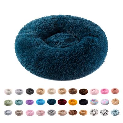 China Travel Dropshipping Round Fluffy Soothing Waterproof Pet Bed And Dog Bed for sale