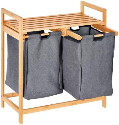 China Bamboo Twist Frame Sorter Laundry Hamper With Two Bags And Removable Shelf Holders for sale