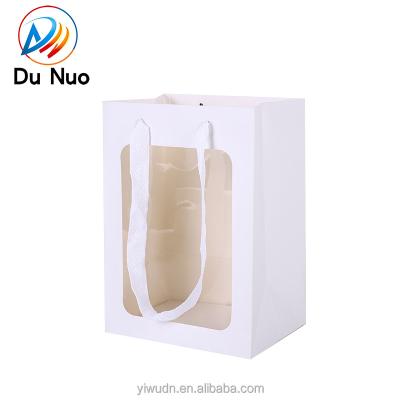 China Recyclable Custom Transparent Window Wedding Paper Gift Florist Bags With Handle for sale