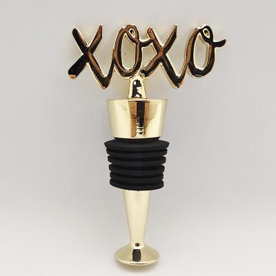 China Novelty Gold XOXO Decorative Metal Wine Viable Wording Stopper for sale