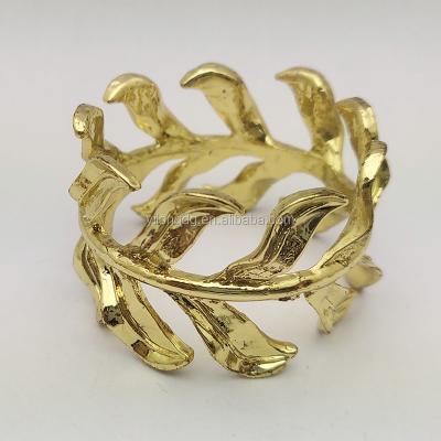 China Sustainable Novelty Round Leaf Metal Gold Decorative Napkin Ring for sale