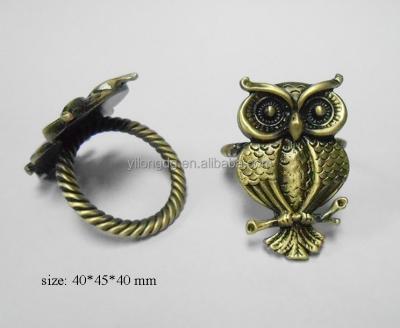 China Viable Metal Owl Brass Novelty Festival Decorative Napkin Ring for sale