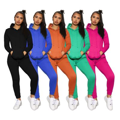 China 2020 wholesale pure color sports breathable hooded tracksuits and hoodies women for sale