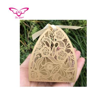 China Recyclable Four Side Folding Original Design Laser Cut Wedding Favor Candy Box for sale