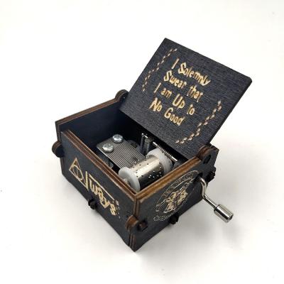 China Gift Most Popular Mini Hand Crank Music Box Harry Potter Handmade Wooden Colorful Music Box for sale