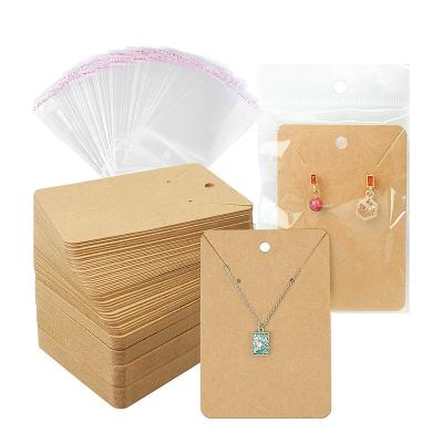 China Artificial Earring Necklace Display Cards With Bags Wrapping Paper Tags for sale