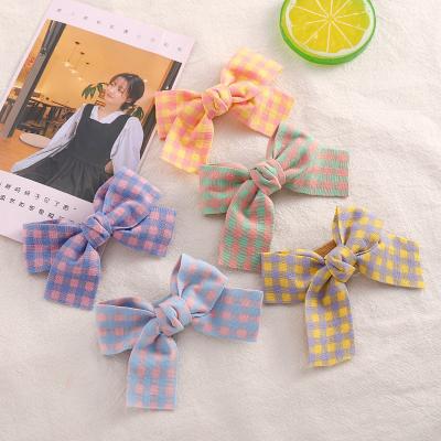 China Decorate New Hot Sale Spring Style Grid Pattern Kids Cloth Flower Bowknot Platypus Clip Side Hits Clip For Girls Hair Accessories for sale