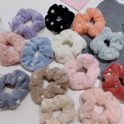 China Fashion Hot Sale Flannel Scrunchies Plush Pearl Hair Bands Soft Candy Colors Hair Rope Big For Women Girls Ponytail Holders for sale