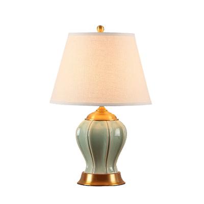 China Chinese modern simple hotel bedroom study bedroom lamp porcelain green jade ceramic Chinese style table lamp for sale